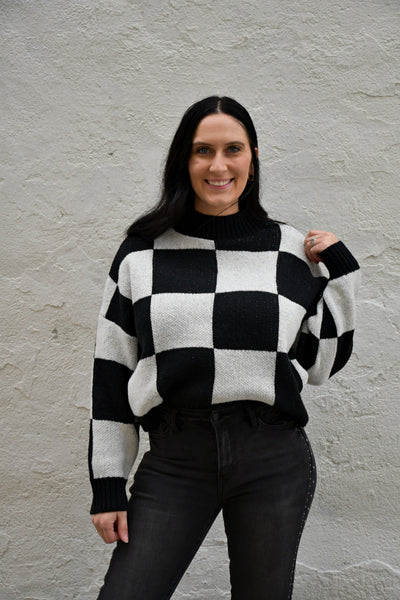 Queens Checkered Black Sweater