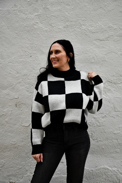 Queens Checkered Black Sweater